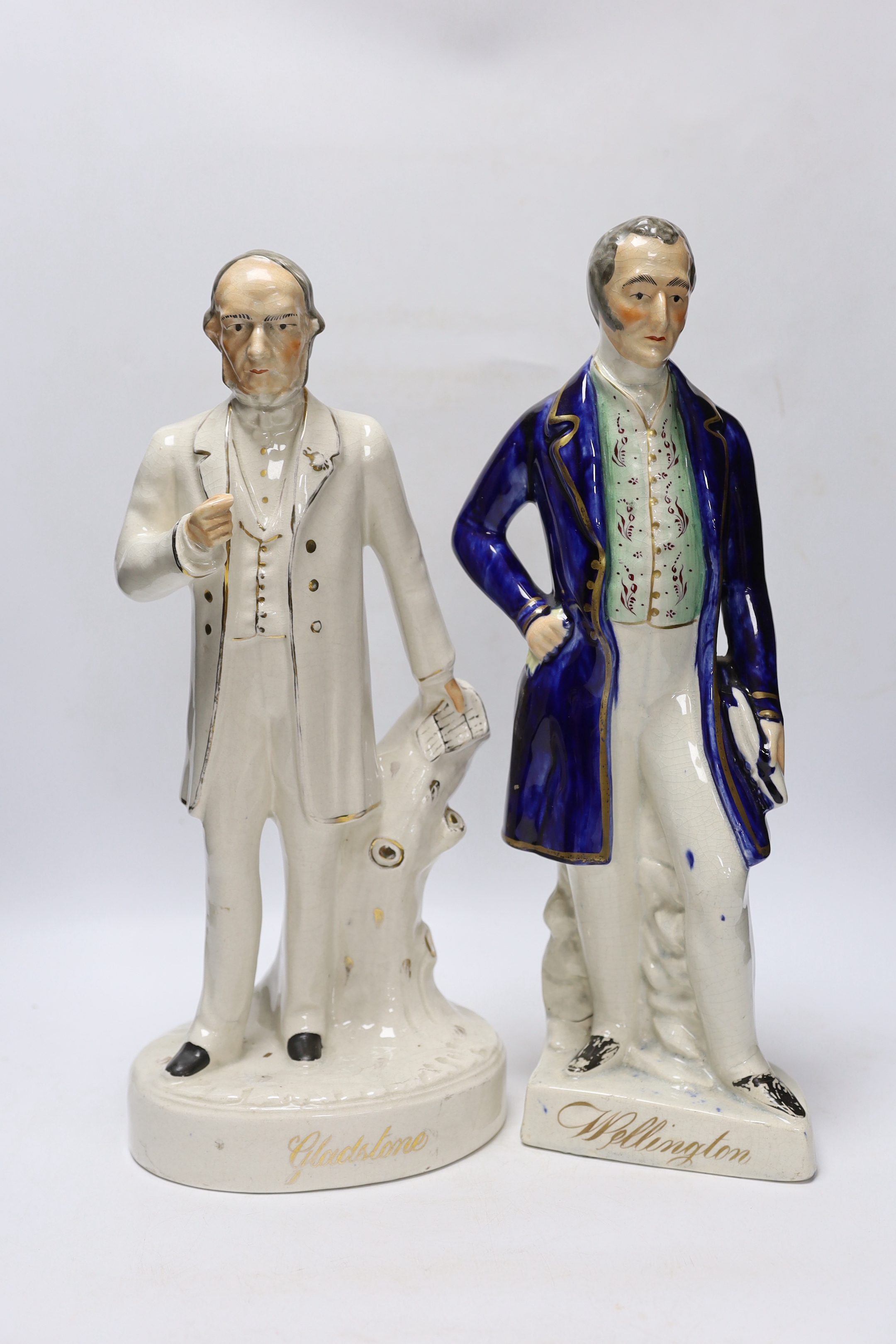 Military and Political Staffordshire figures - A Crimean war group of France, England and Turkey, a figure of Wellington as Prime Minister, a figure of Gladstone, a Nelson Toby jug and a General Hill/Marquis Wellington c